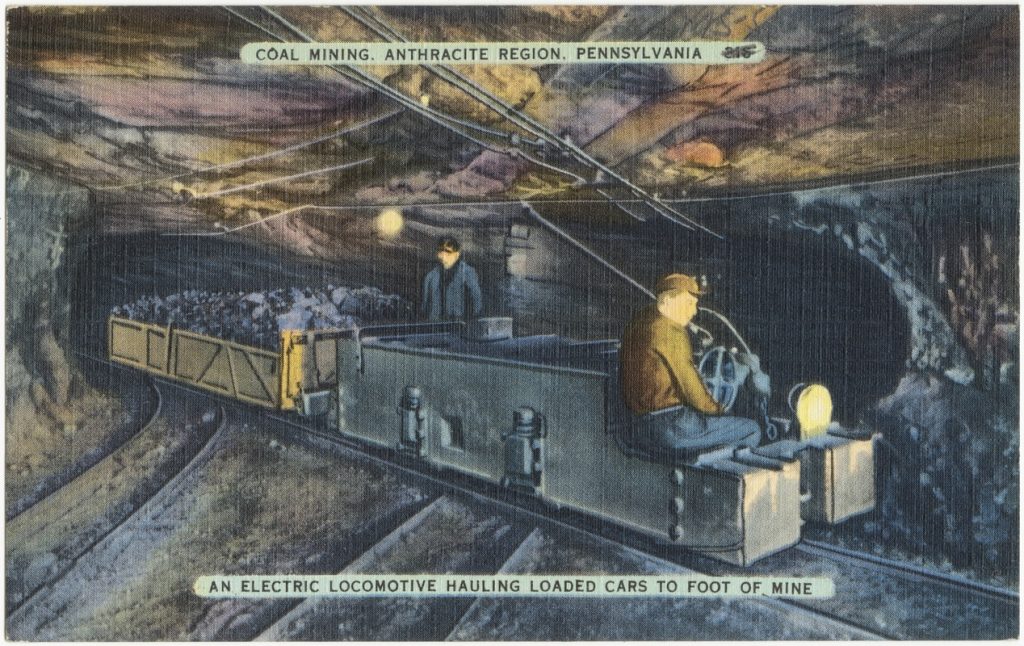 Postal de la minería del carbón. Una locomotora eléctrica acarreando vagones a la base de la mina. Coal Region de Pensilvania. Estados Unidos. 1930