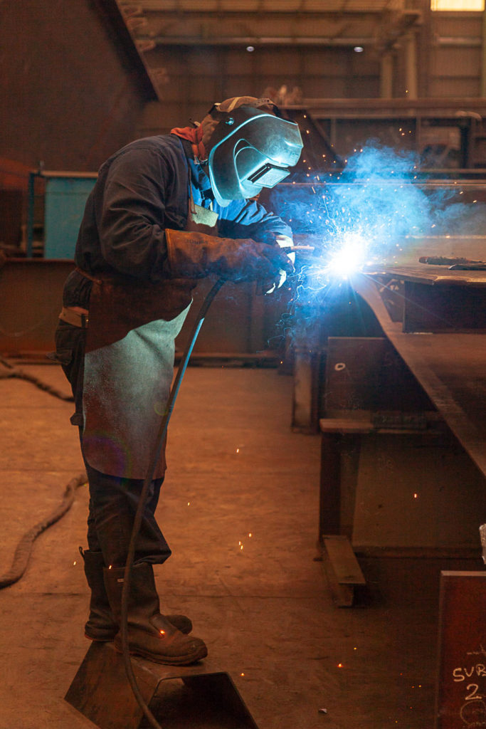 Últimos trabajadores de la factoría industrial de Construcciones Navales del Norte. La Naval. Sestao. Bizkaia 2019